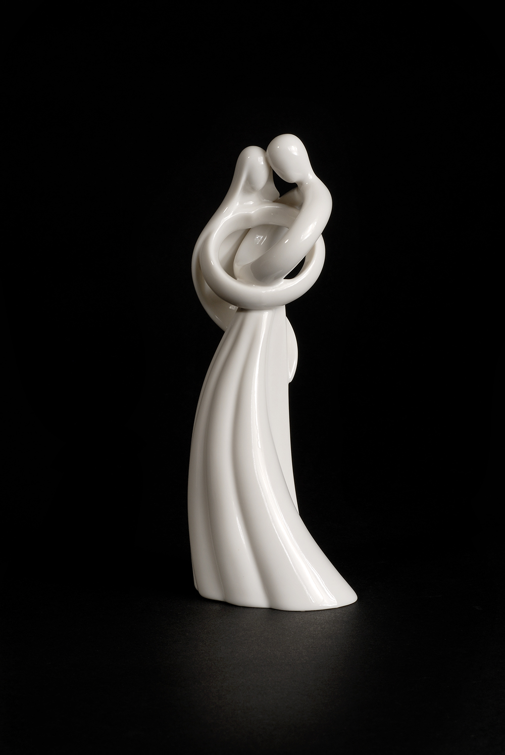 White Ceramic sculpture on black background Product Photography