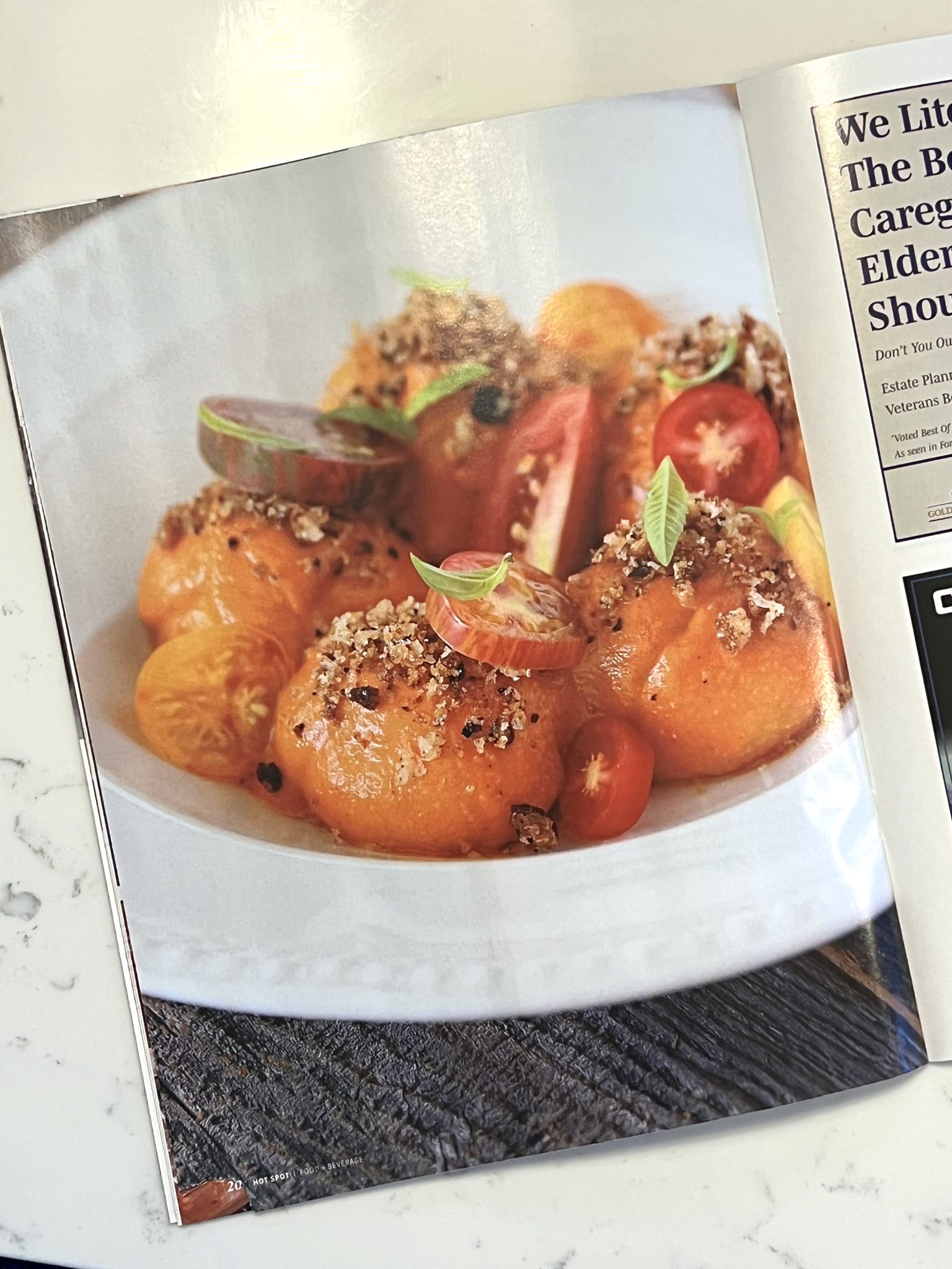 Magazine page of Italian food in white bowl